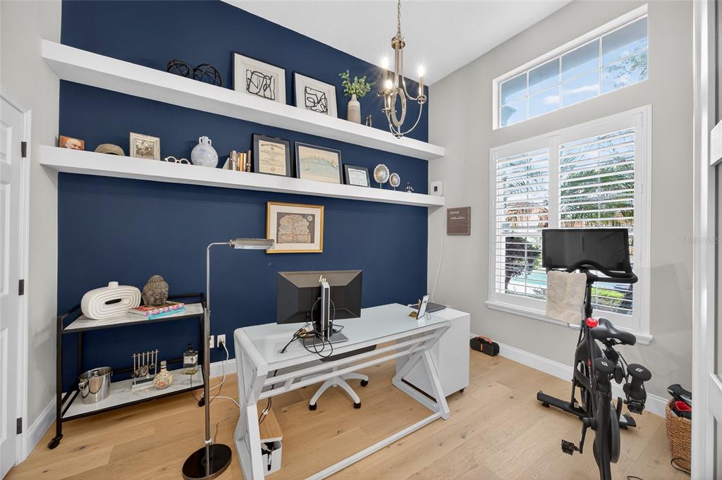 11550 Delwick Drive Windermere, FL 34786 - Photo 13 of 91 a view of a workspace with furniture and a window