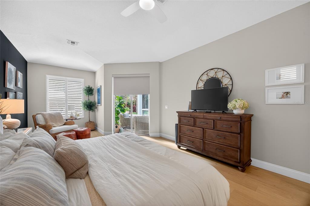 11550 Delwick Drive Windermere, FL 34786 - Photo 21 of 91 a bedroom with a bed and a dresser