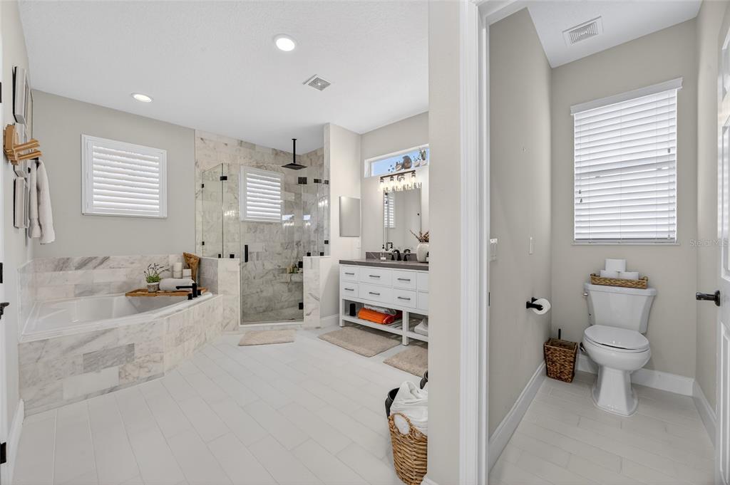 11550 Delwick Drive Windermere, FL 34786 - Photo 23 of 91 a bathroom with a sink a toilet and a view of bathroom