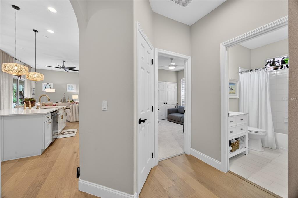 11550 Delwick Drive Windermere, FL 34786 - Photo 34 of 91 a view of a kitchen with refrigerator and wooden floor