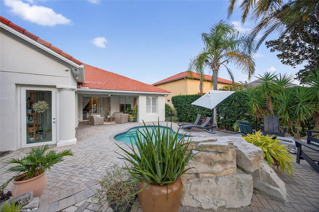 11550 Delwick Drive Windermere, FL 34786 - Photo 75 of 91 a view of a house with a patio