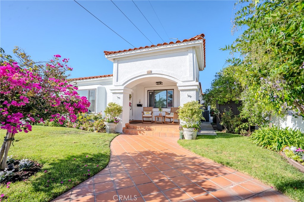 5039 West 134th Street Hawthorne, CA 90250 - Photo 1 of 30 a view of a house with a garden