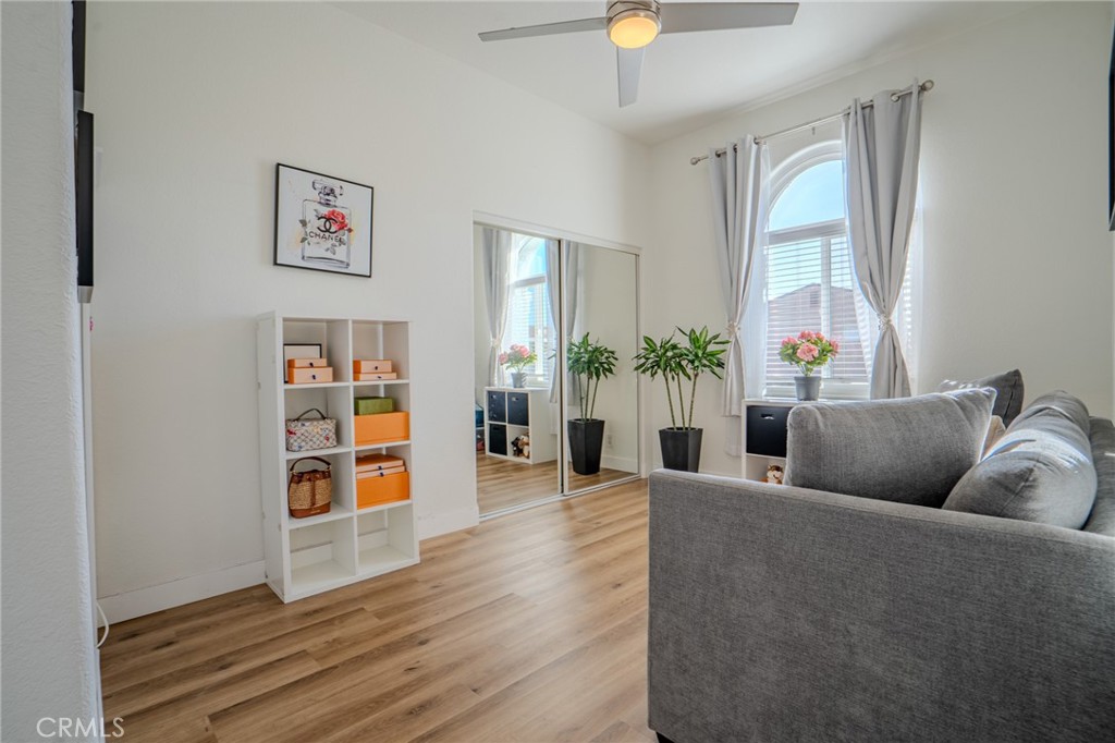 5039 West 134th Street Hawthorne, CA 90250 - Photo 17 of 30 a living room with furniture and a potted plant