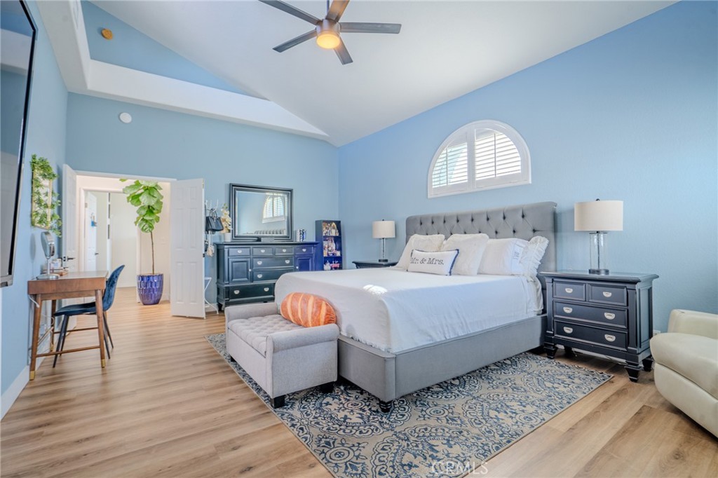 5039 West 134th Street Hawthorne, CA 90250 - Photo 20 of 30 a bedroom with a bed and wooden floor