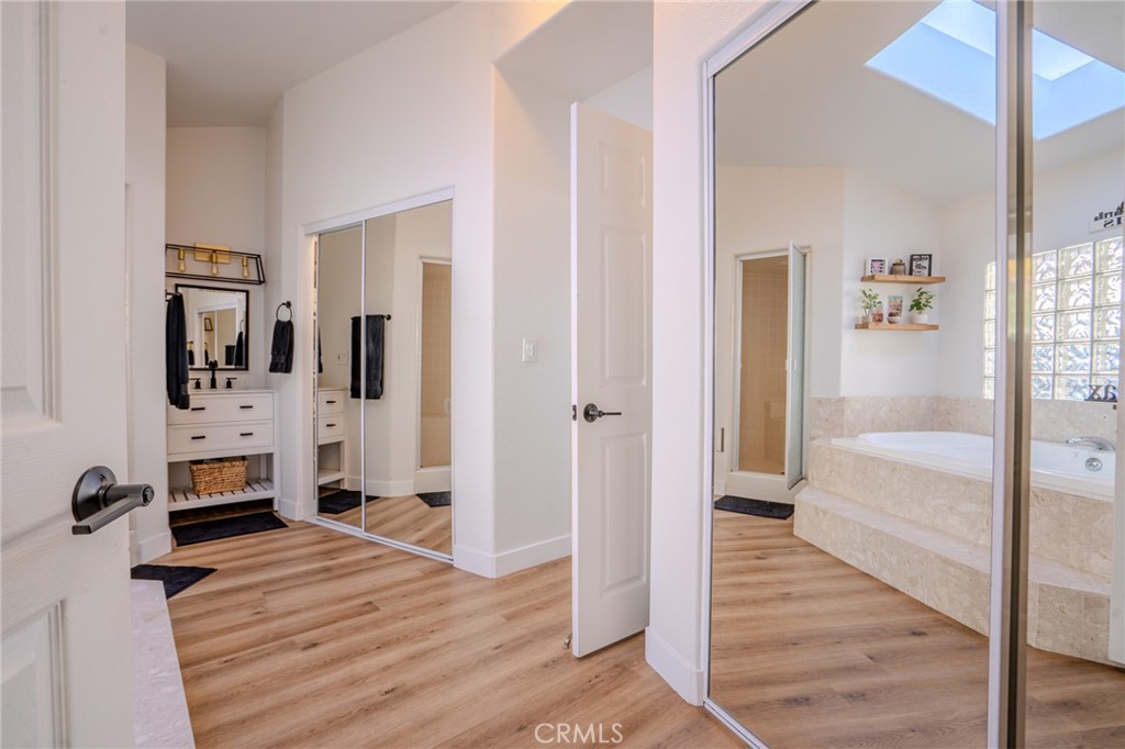 5039 West 134th Street Hawthorne, CA 90250 - Photo 22 of 30 a view of a bedroom with wooden floor and white walls