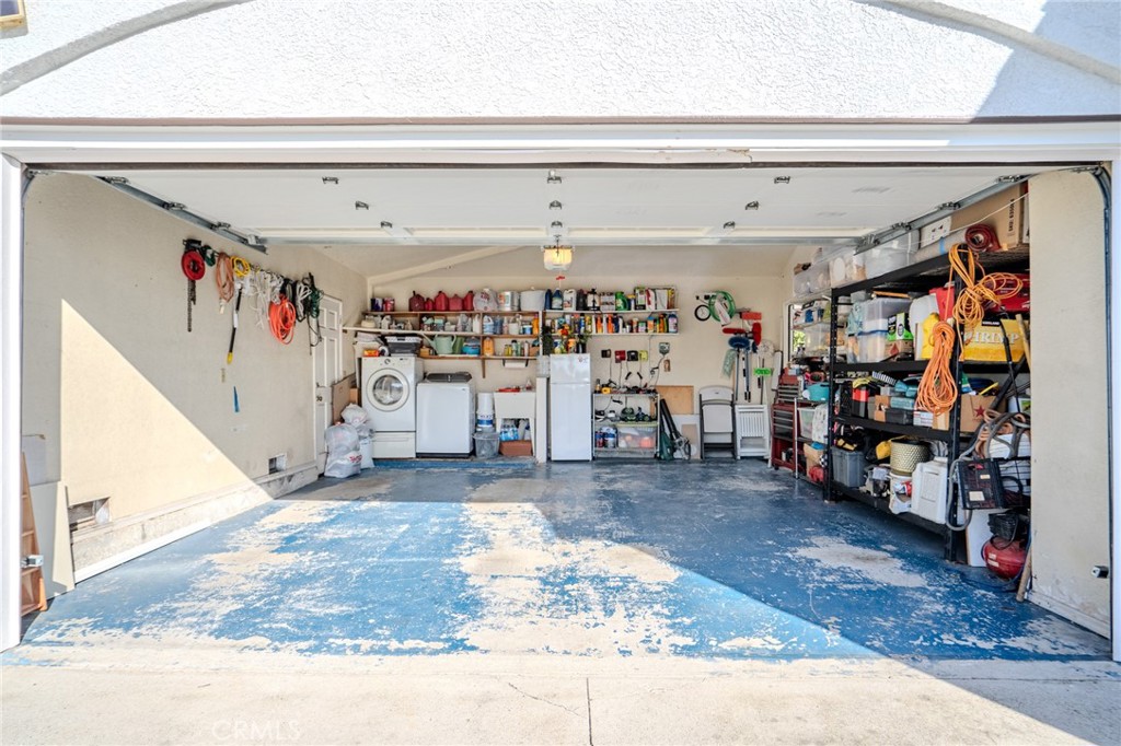 5039 West 134th Street Hawthorne, CA 90250 - Photo 30 of 30 a view of a garage with a bike and car