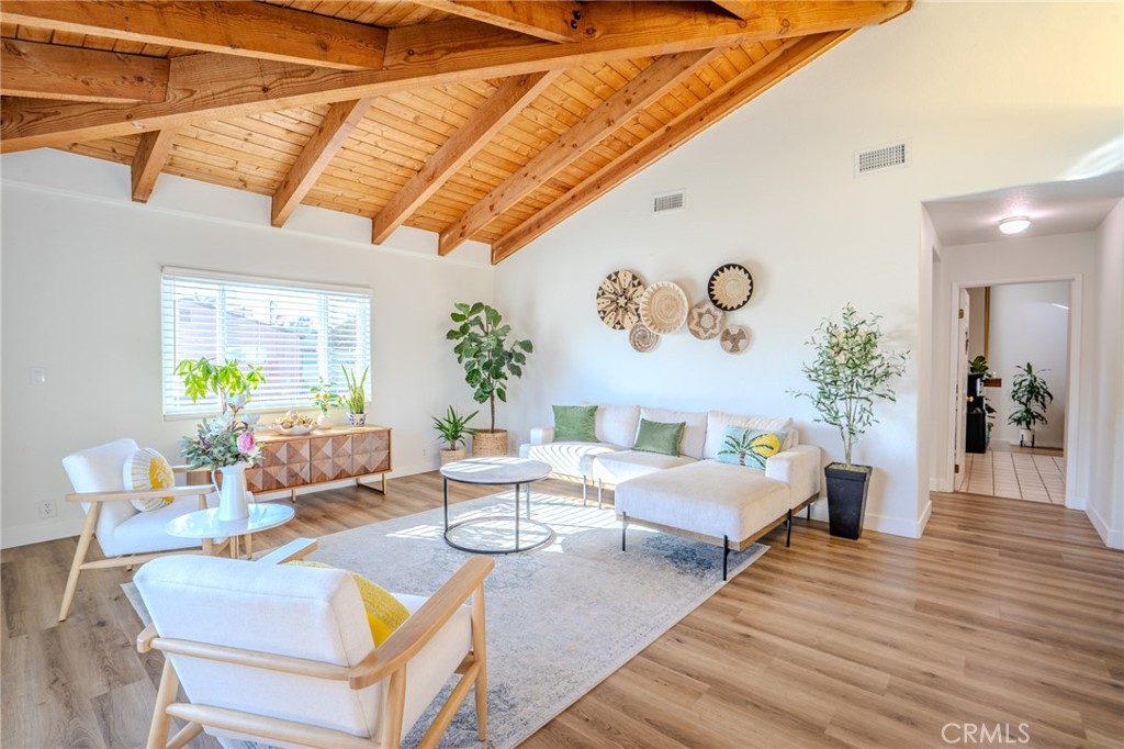 5039 West 134th Street Hawthorne, CA 90250 - Photo 9 of 30 a living room with furniture and wooden floor