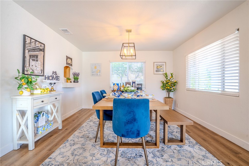 5039 West 134th Street Hawthorne, CA 90250 - Photo 10 of 30 a view of a dining room with furniture window and wooden floor