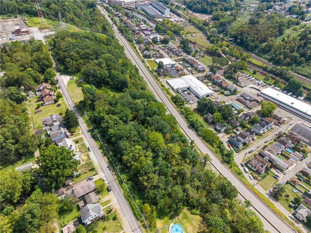 Parcel 120 Rachel Street Turtle Creek, PA 15145 - Photo 2 of 6 an aerial view of residential houses with outdoor space