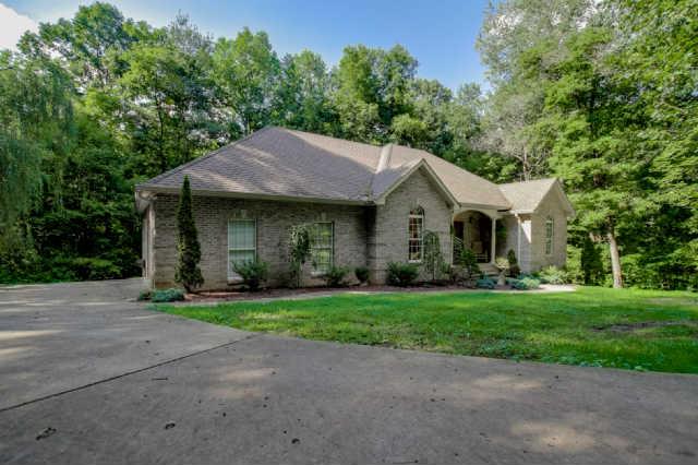 8805 Byrum Chapel Road Portland, TN 37148 - Photo 2 of 19 Two car garage on the left side of this beautiful all brick home on 4 private acres!