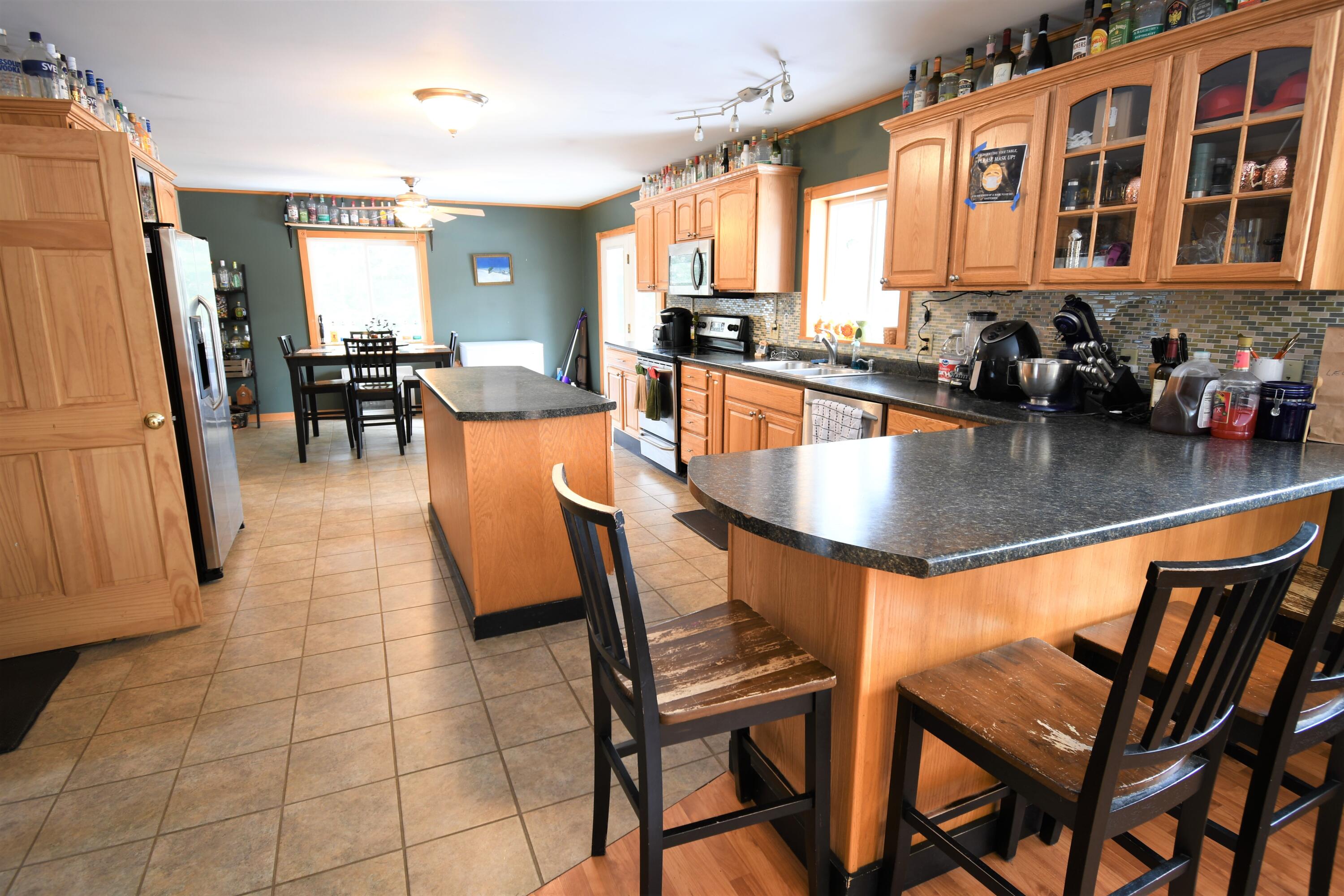 117 Fowler Road Thorndike, ME 04986 - Photo 4 of 27 Kitchen and Dining Area