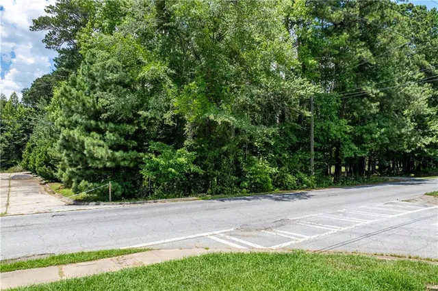 a view of backyard with green space