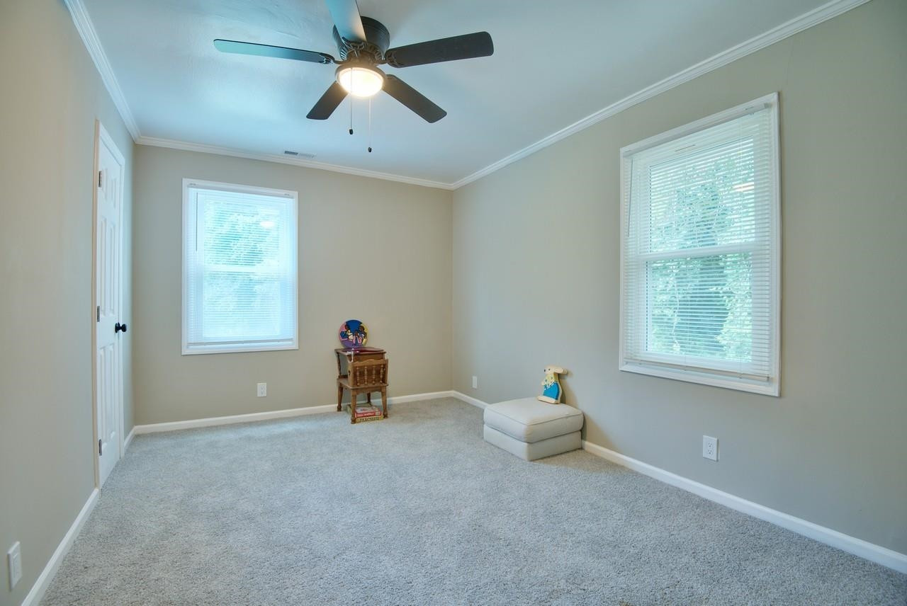 117 West Cornwallis Road Durham, NC 27707 - Photo 20 of 35 At the right, rear of hoime.
