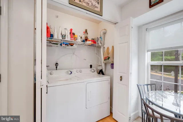a utility room with dryer and washer