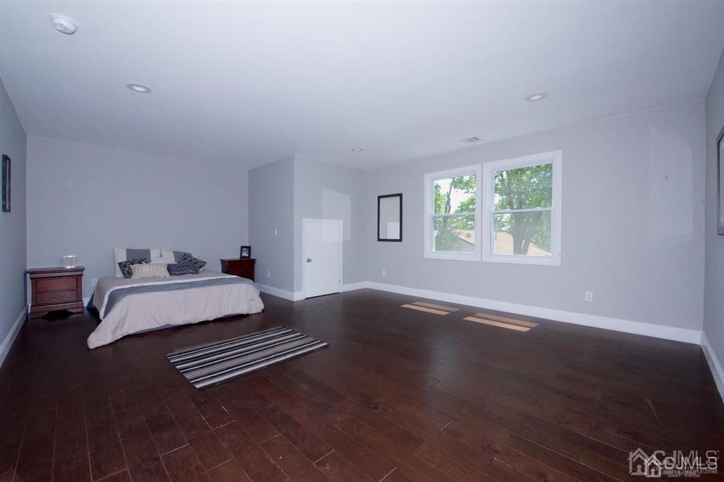 12 Cottrell Road Matawan, NJ 07747 - Photo 28 of 38 a living room with furniture and a window