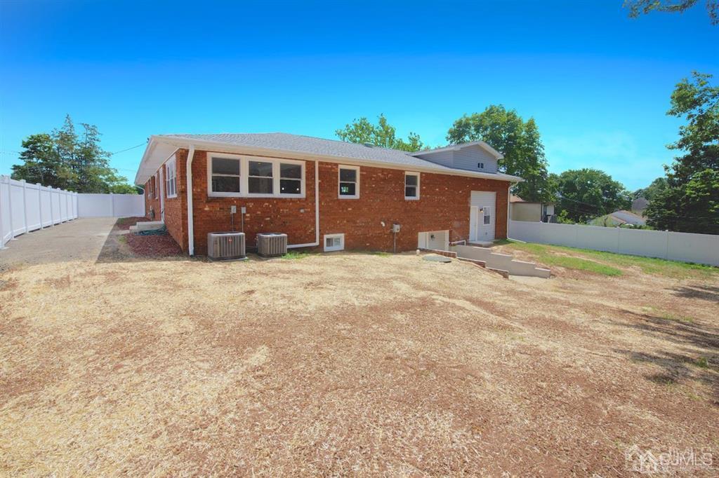 12 Cottrell Road Matawan, NJ 07747 - Photo 38 of 38 a front view of a house with a yard