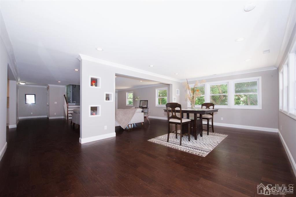 12 Cottrell Road Matawan, NJ 07747 - Photo 9 of 38 a dining room with furniture and wooden floor