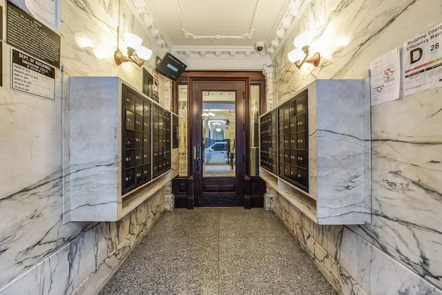 a front view of a building with a glass door