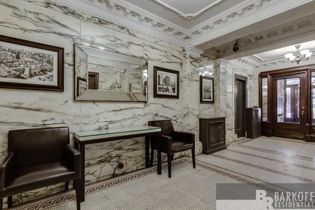 a hall way with furniture