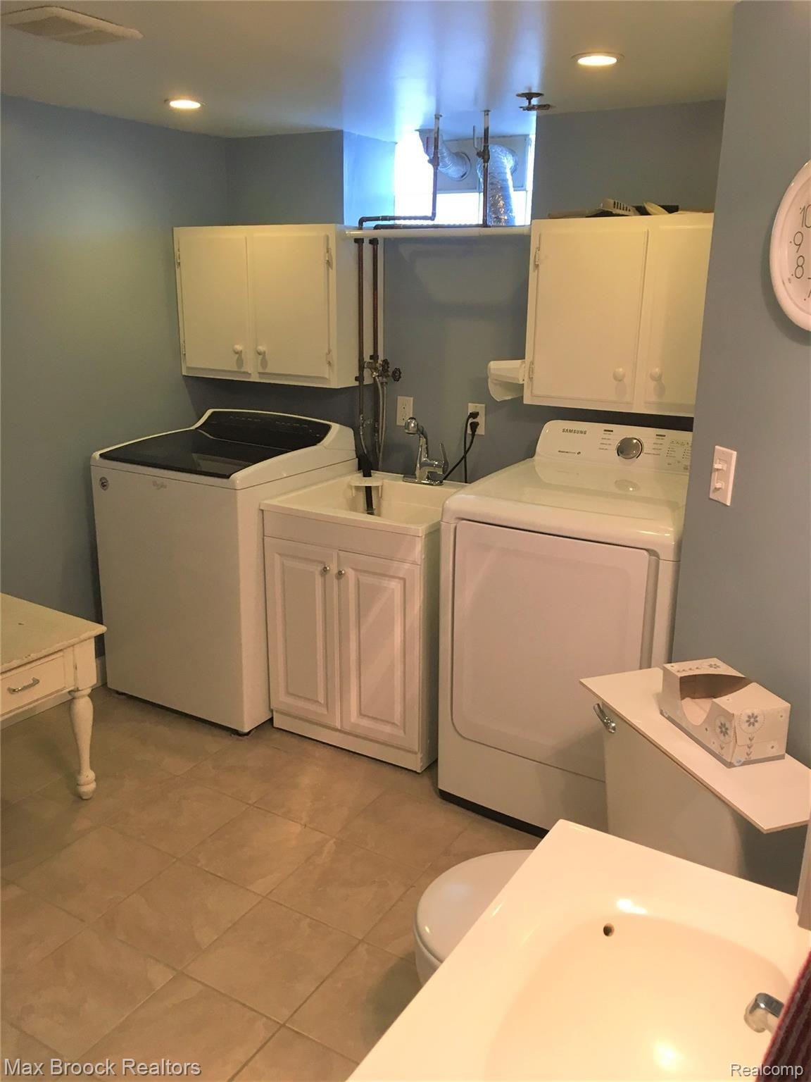 22725 Power Road Farmington, MI 48336 - Photo 21 of 25 Laundry Room with brand new washer and dryer
