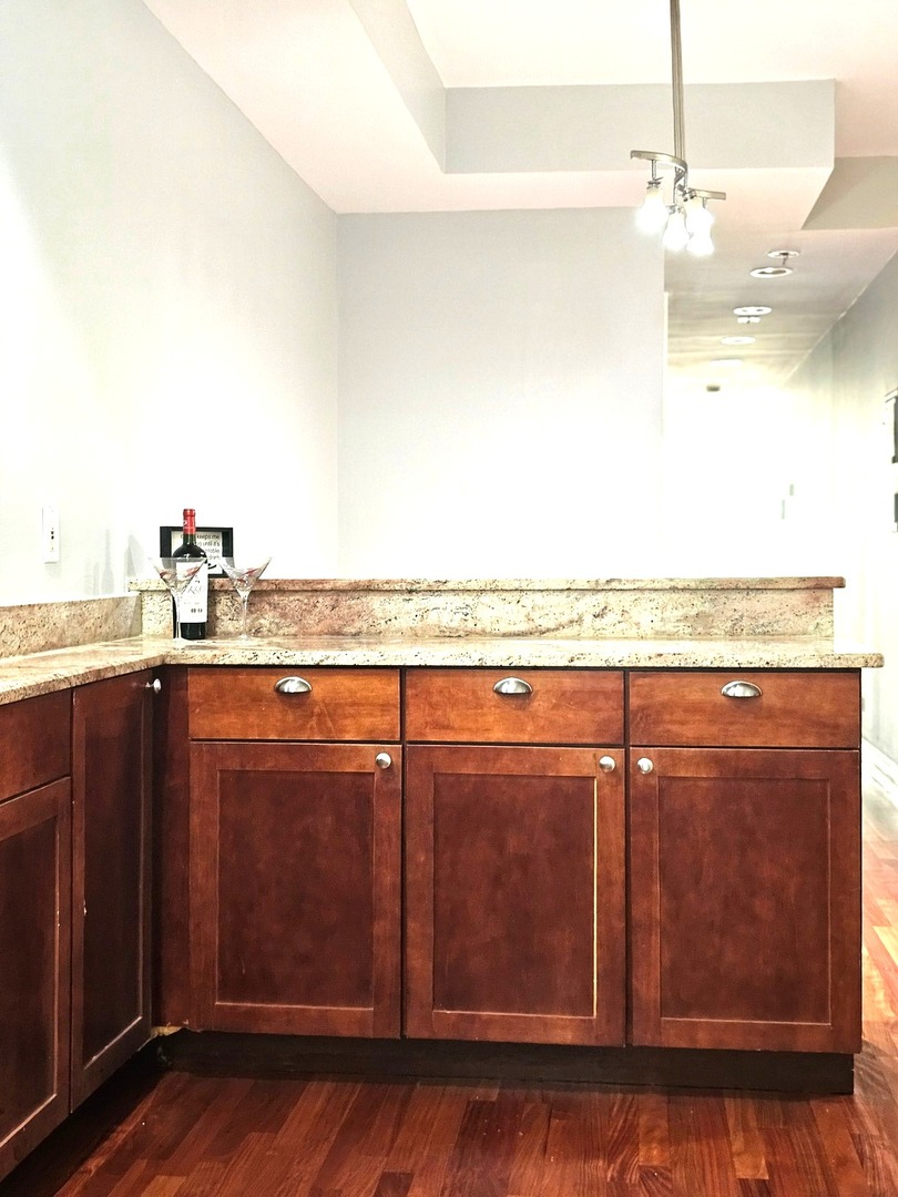 1520 East Marquette Road, Unit 2B Chicago, IL 60637 - Photo 14 of 44 a view of a room with wooden floor