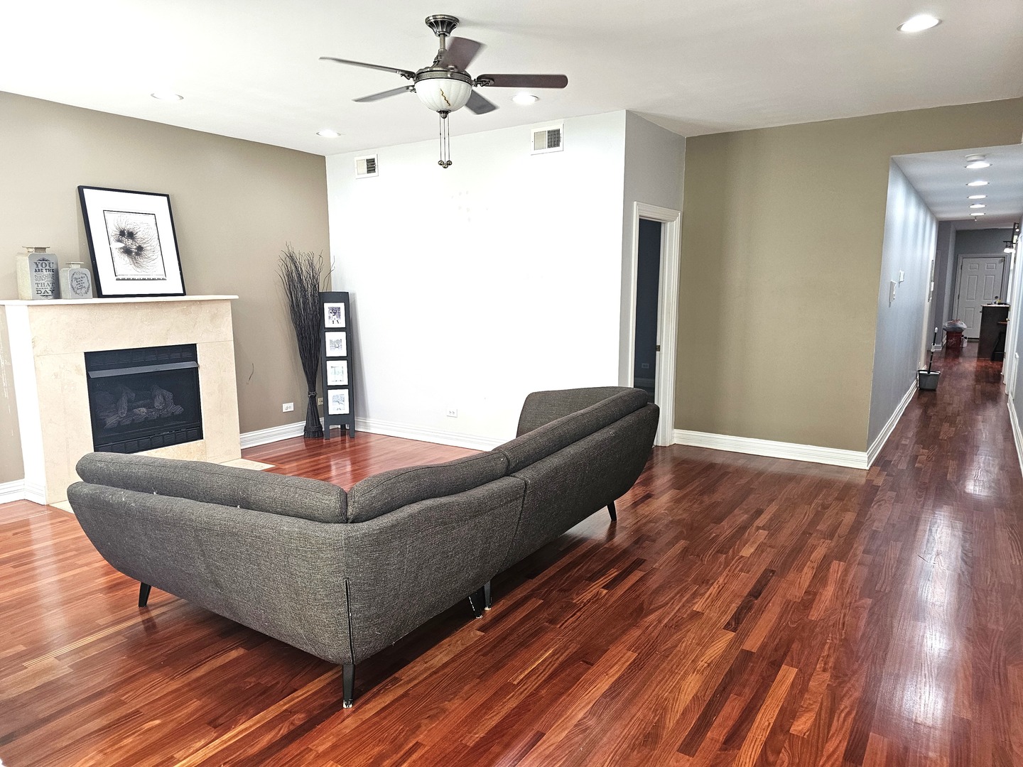 1520 East Marquette Road, Unit 2B Chicago, IL 60637 - Photo 2 of 44 a living room with furniture and a fireplace