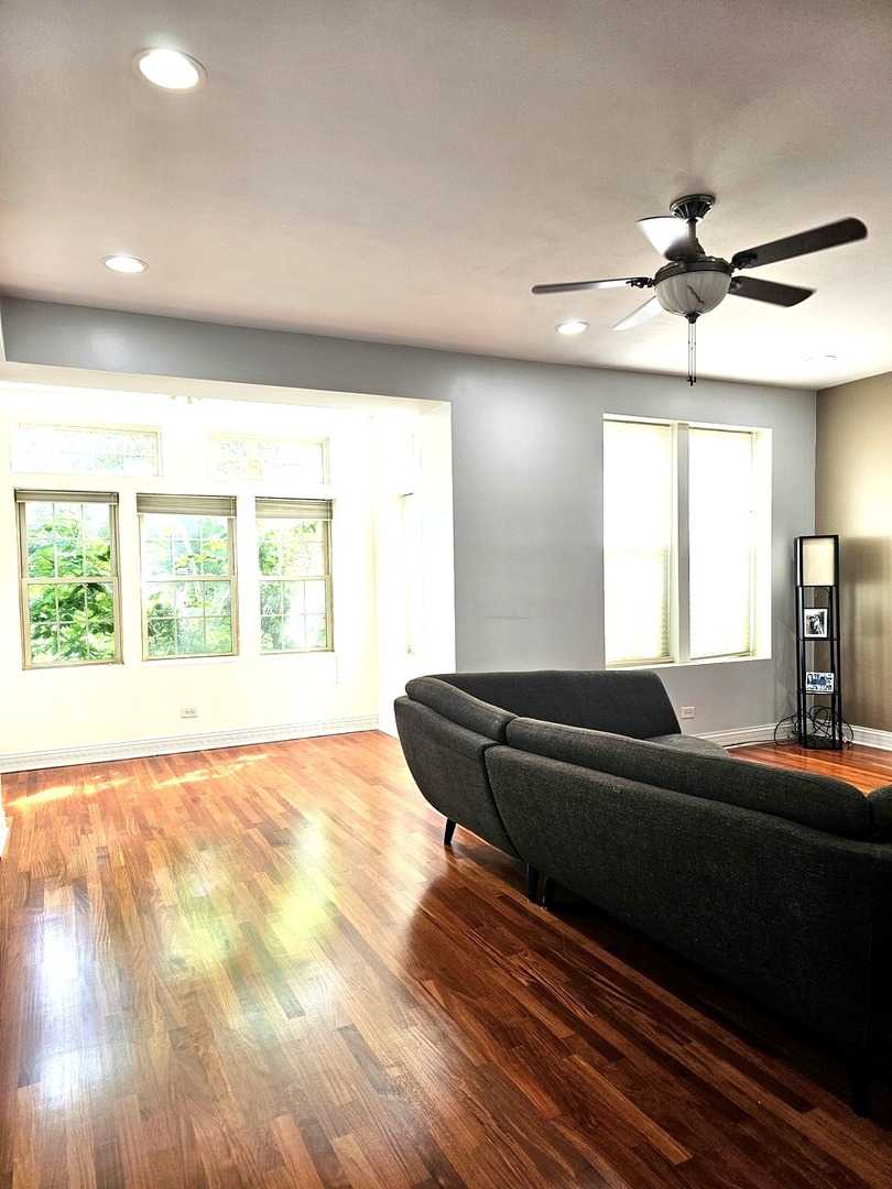 1520 East Marquette Road, Unit 2B Chicago, IL 60637 - Photo 4 of 44 a living room with furniture and a large window