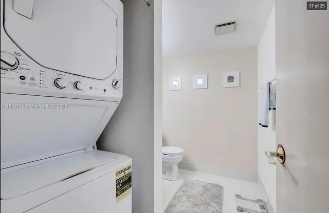 a bathroom with a toilet and a sink