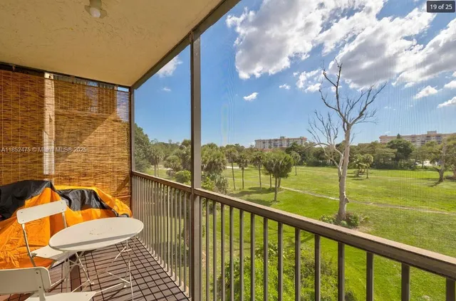 a view of a balcony with a swing