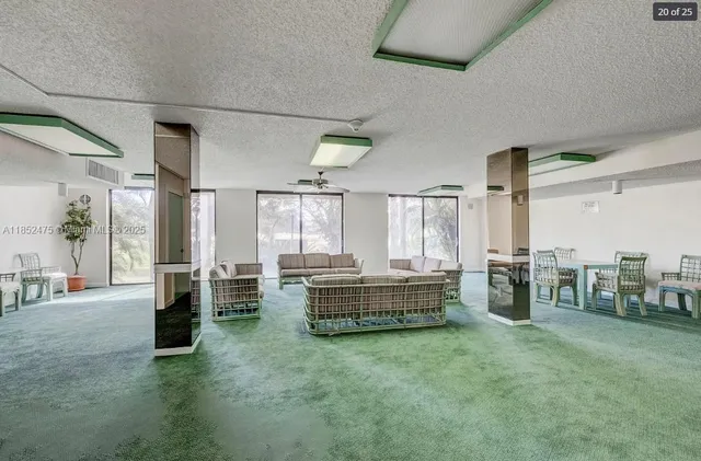 a view of a swimming pool with a yard