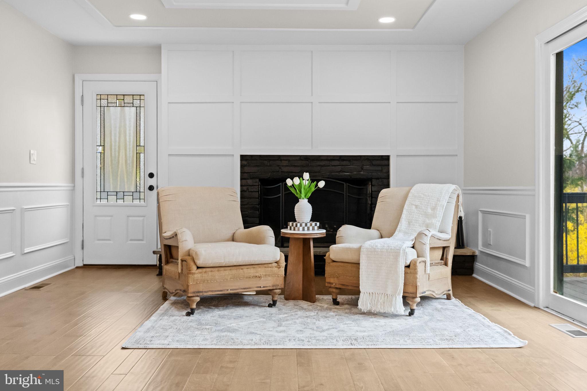 971 Stevens Lane Wayne, PA 19087 - Photo 12 of 66 a living room with fireplace furniture and a rug