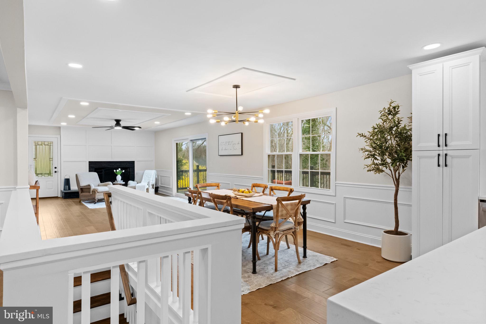 971 Stevens Lane Wayne, PA 19087 - Photo 19 of 66 a view of a dining room with furniture window and wooden floor