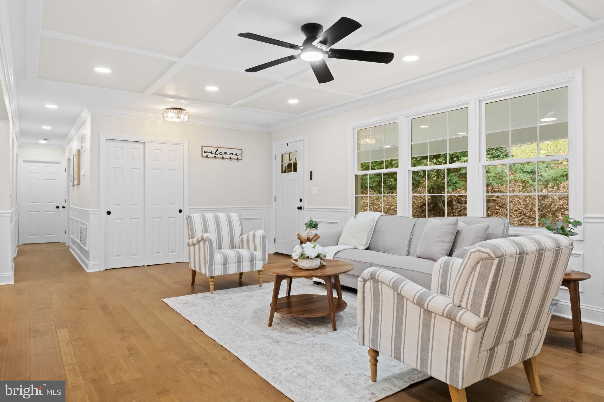 971 Stevens Lane Wayne, PA 19087 - Photo 27 of 66 a living room with furniture and a large window