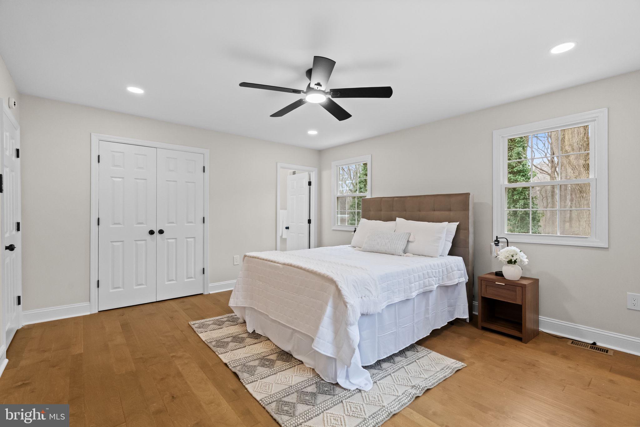 971 Stevens Lane Wayne, PA 19087 - Photo 36 of 66 a spacious bedroom with a bed and a window