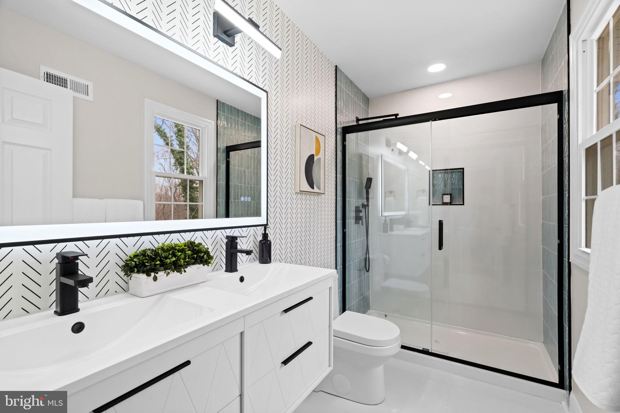 971 Stevens Lane Wayne, PA 19087 - Photo 38 of 66 a bathroom with a sink and a mirror