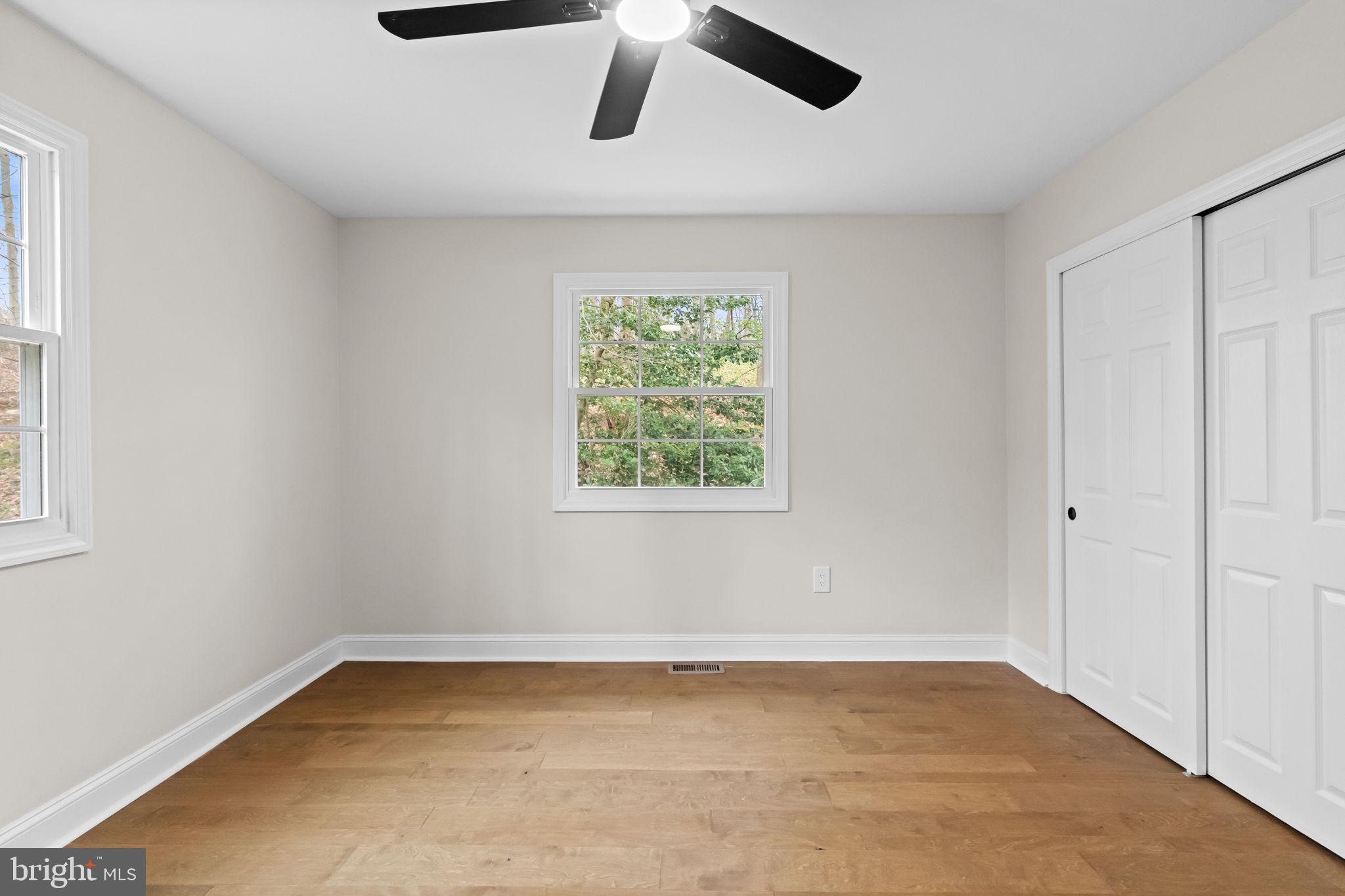 971 Stevens Lane Wayne, PA 19087 - Photo 40 of 66 wooden floor in an empty room with a window