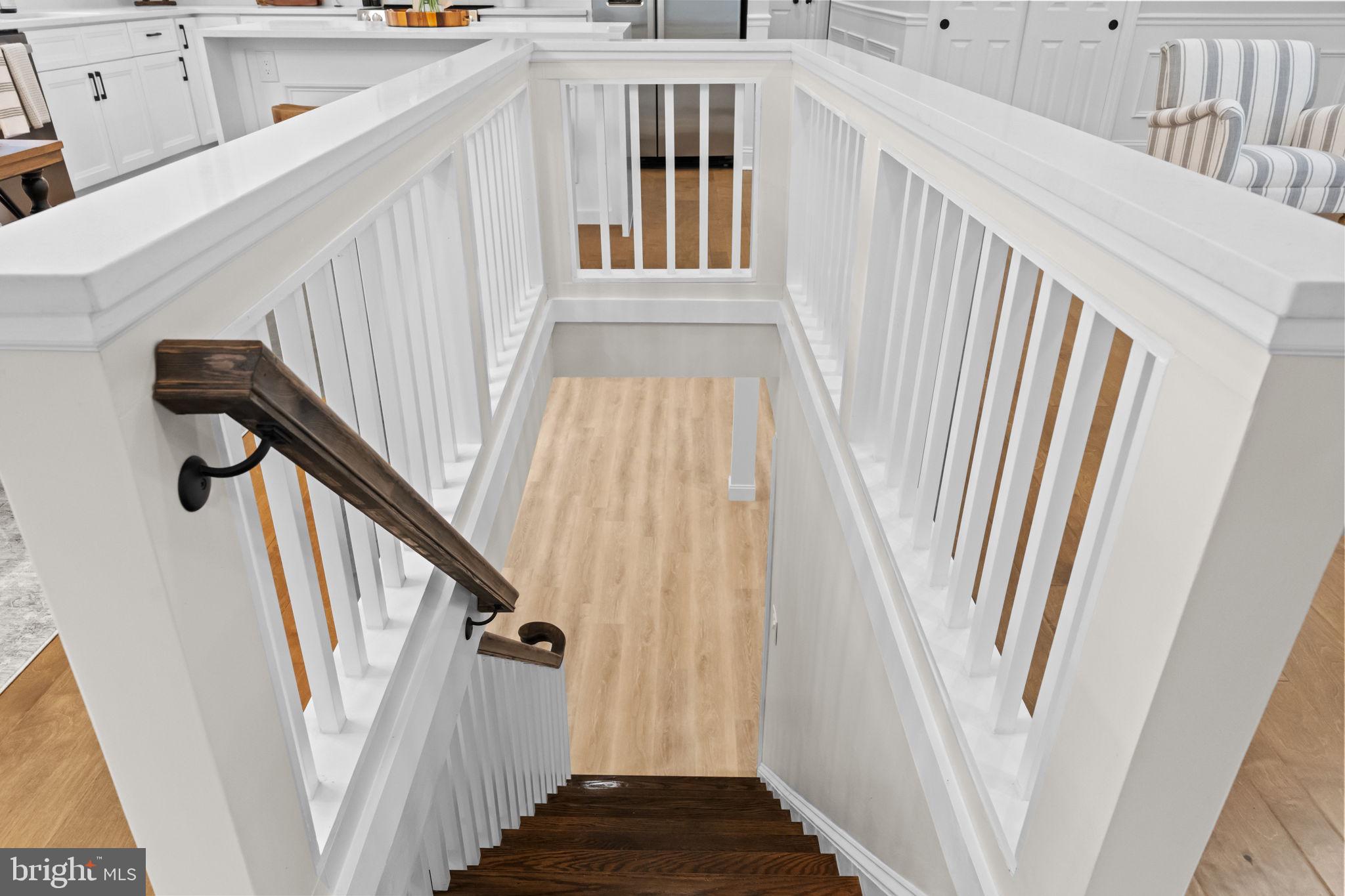 971 Stevens Lane Wayne, PA 19087 - Photo 41 of 66 a view of staircase with railing and white walls