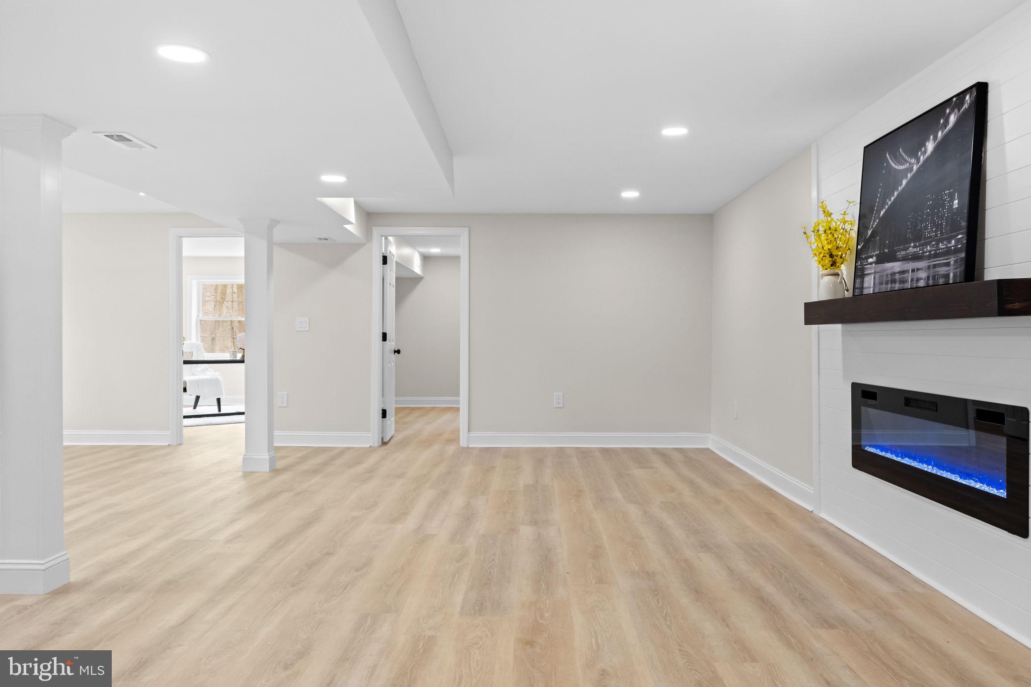 971 Stevens Lane Wayne, PA 19087 - Photo 45 of 66 a view of an empty room with a fireplace