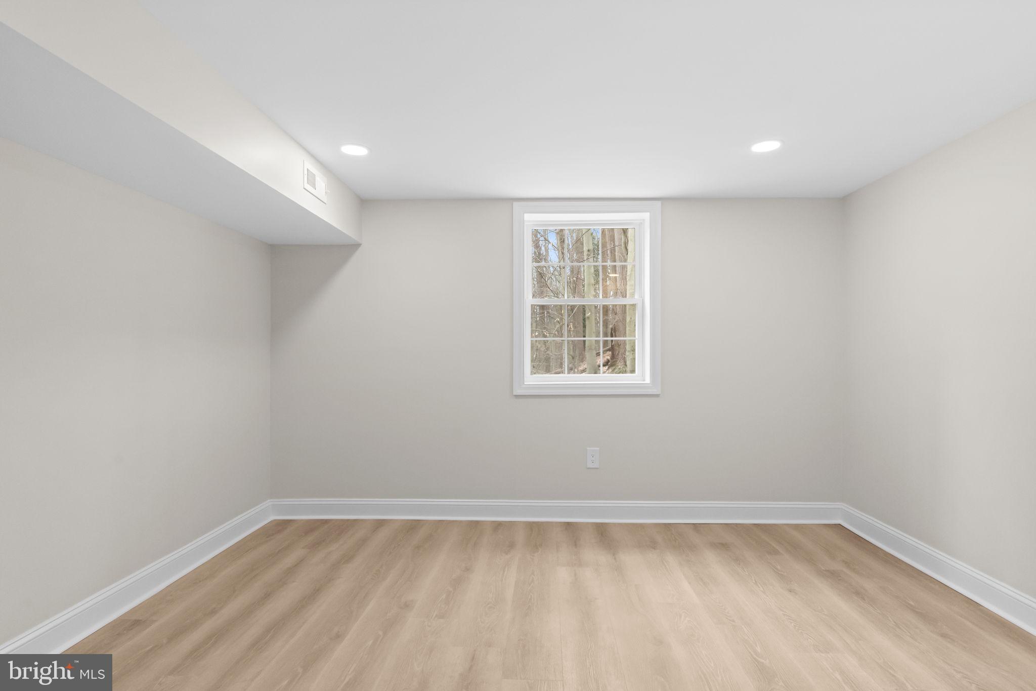 971 Stevens Lane Wayne, PA 19087 - Photo 47 of 66 an empty room with a window