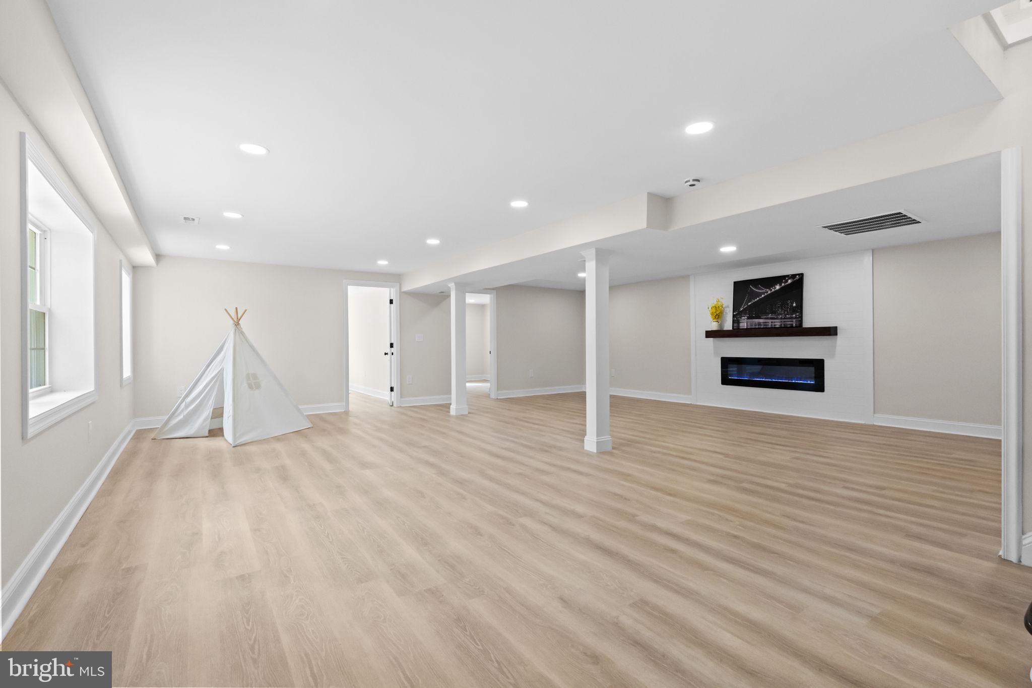 971 Stevens Lane Wayne, PA 19087 - Photo 51 of 66 a view of empty room with wooden floor