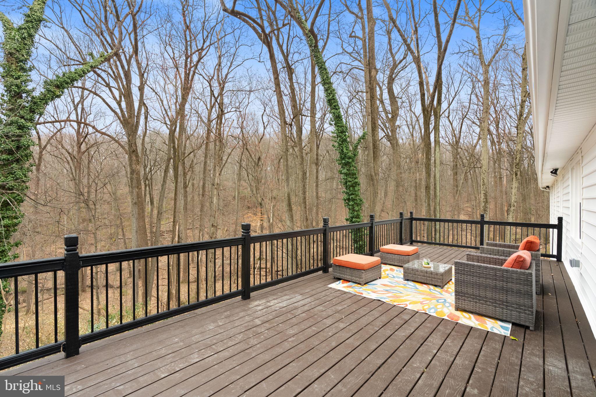 971 Stevens Lane Wayne, PA 19087 - Photo 62 of 66 a balcony with wooden floor and furniture