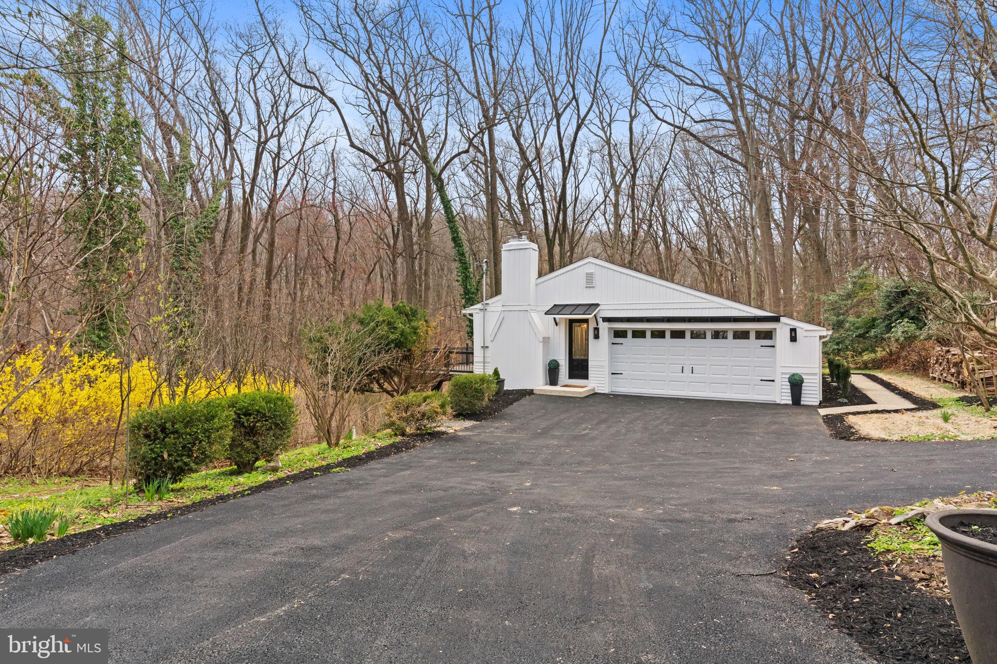 971 Stevens Lane Wayne, PA 19087 - Photo 9 of 66 a view of a house with a yard and large tree