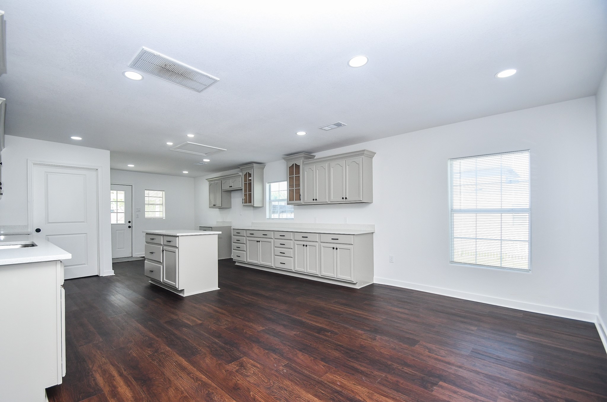 2636 Lone Oak Road Houston, TX 77093 - Photo 8 of 42 Ample natural light flows in through large windows, enhancing the fresh, airy feel.