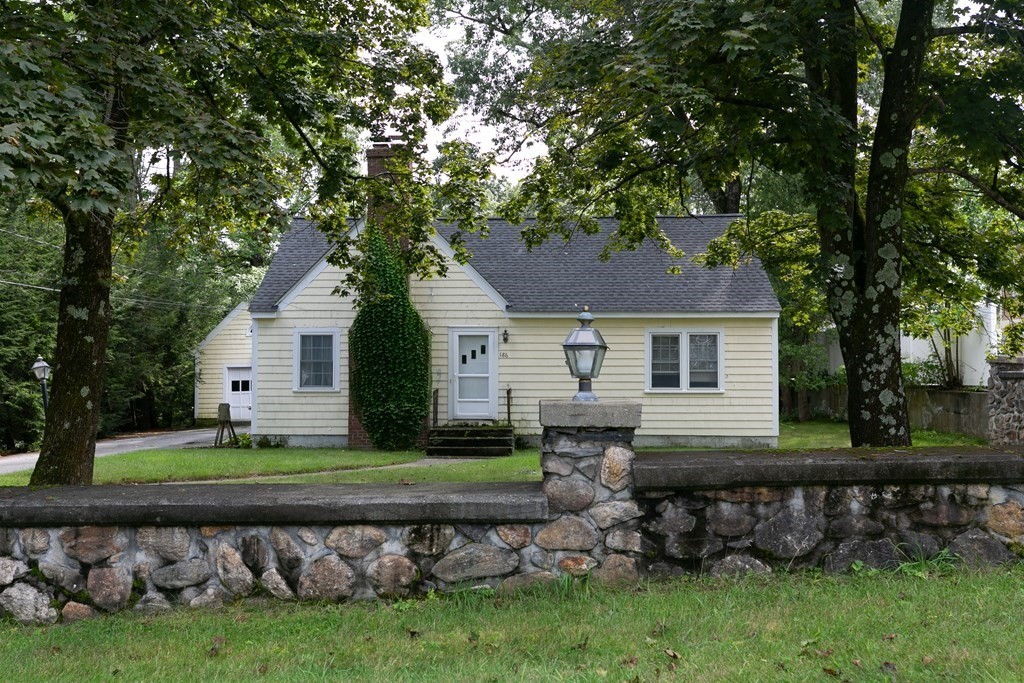 186 Sterling Road Lancaster, MA 01523 - Photo 1 of 40 front view of a house with a yard