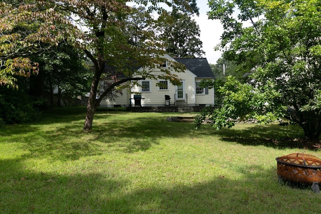 186 Sterling Road Lancaster, MA 01523 - Photo 11 of 40 a front view of a house with garden
