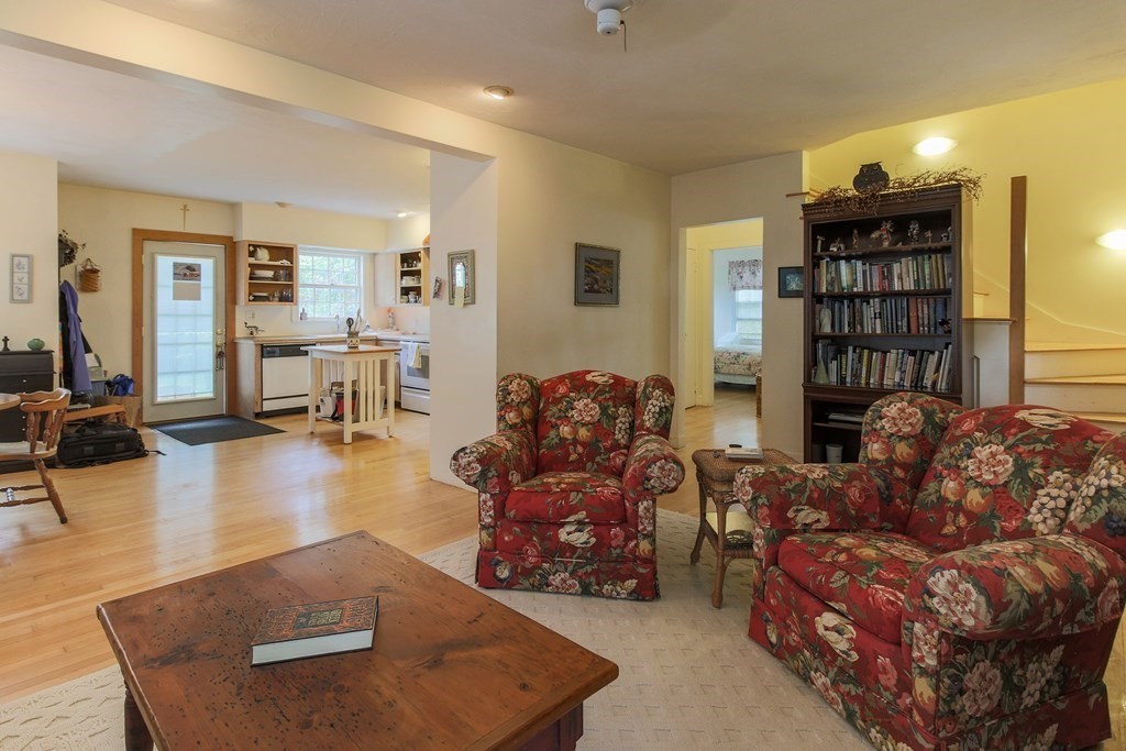186 Sterling Road Lancaster, MA 01523 - Photo 19 of 40 a living room with furniture and wooden floor