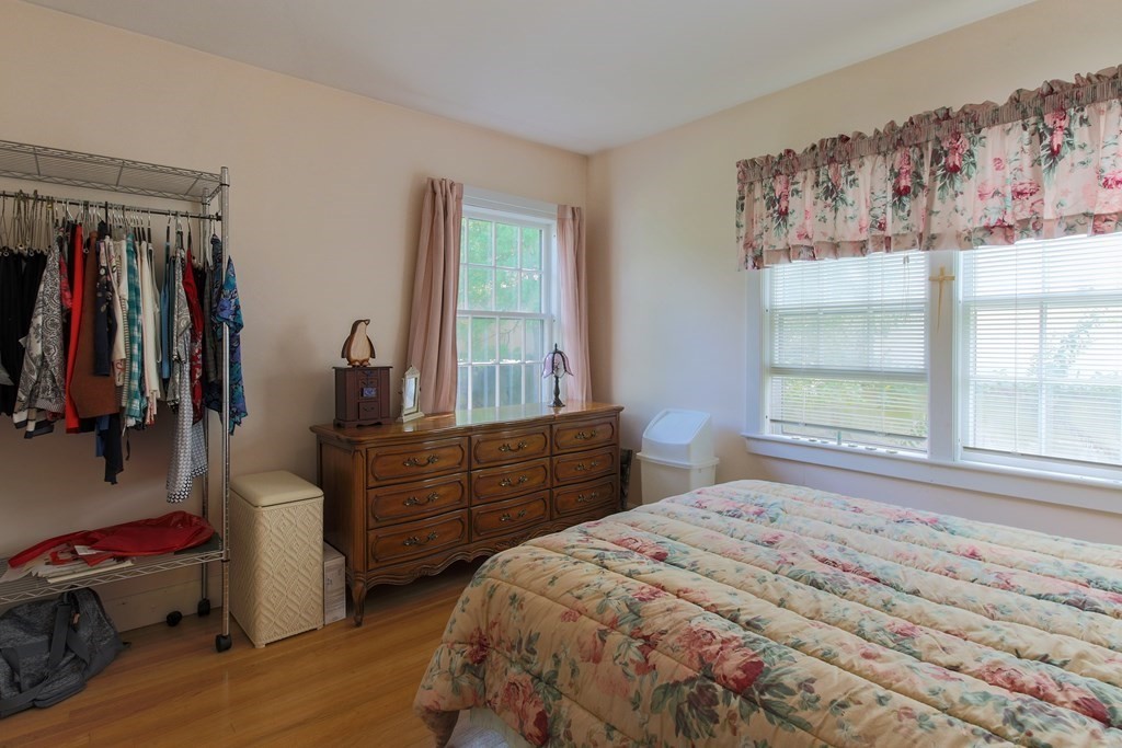 186 Sterling Road Lancaster, MA 01523 - Photo 23 of 40 a bedroom with a bed and a window