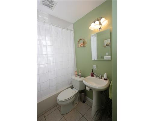 5559 Brownsville Road Baldwin, PA 15236 - Photo 8 of 17 Full Bath. First floor full bath features ceramic tile floors, bath/shower combination, pedestal sink, medicine cabinet and new lighting.