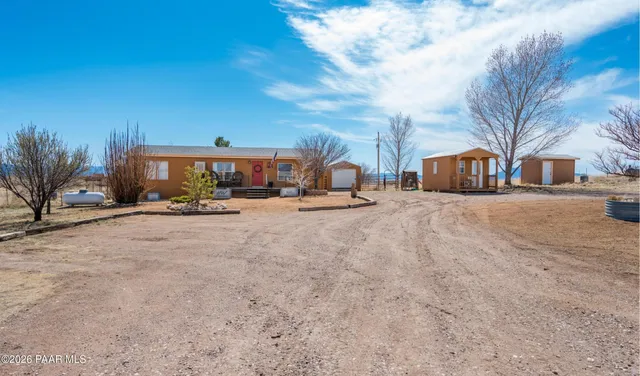 a view of a town with large trees