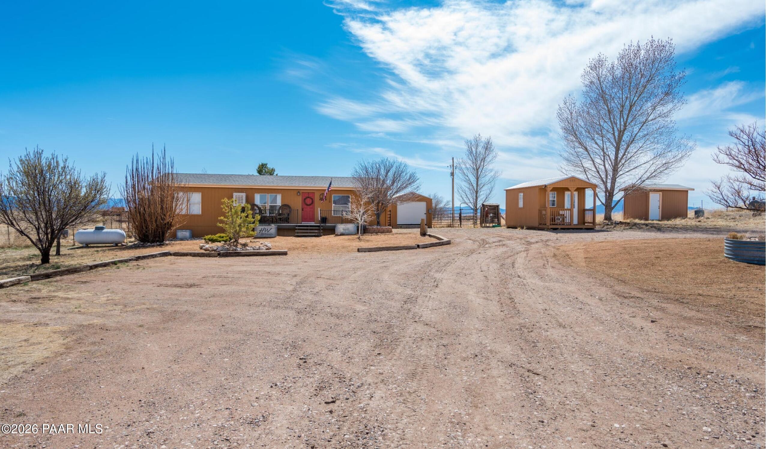 a view of a town with large trees